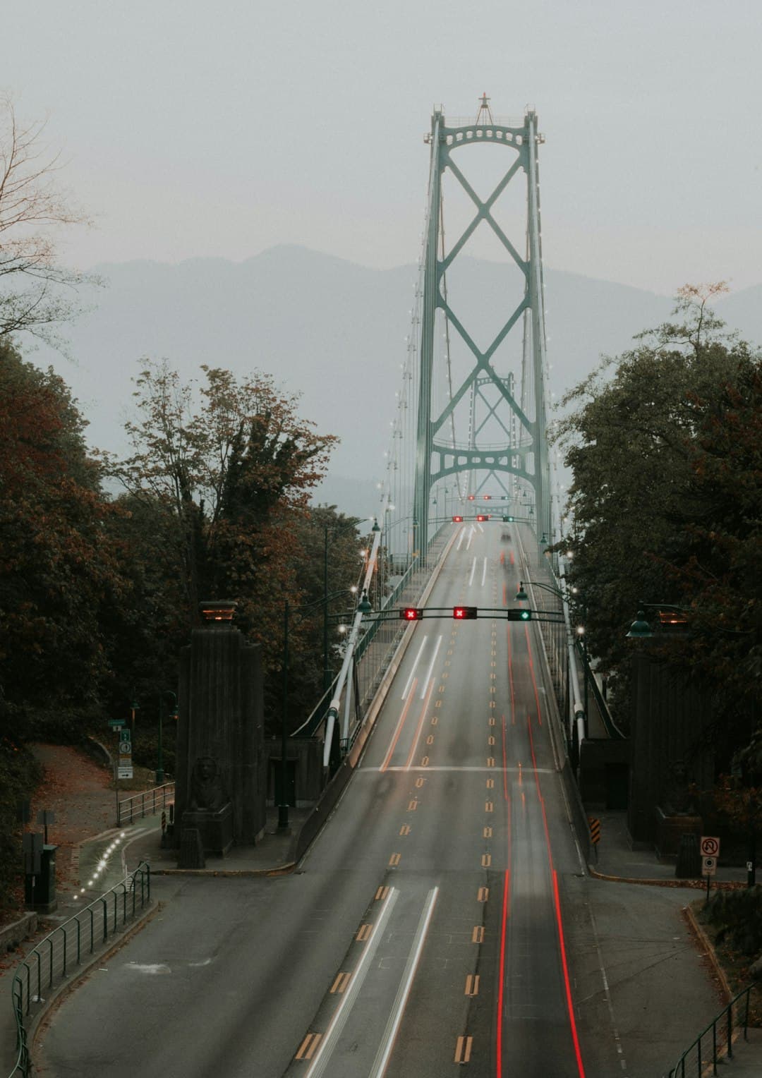 Lions Gate Bridge spanning Burrard Inlet, Vancouver, at morning.